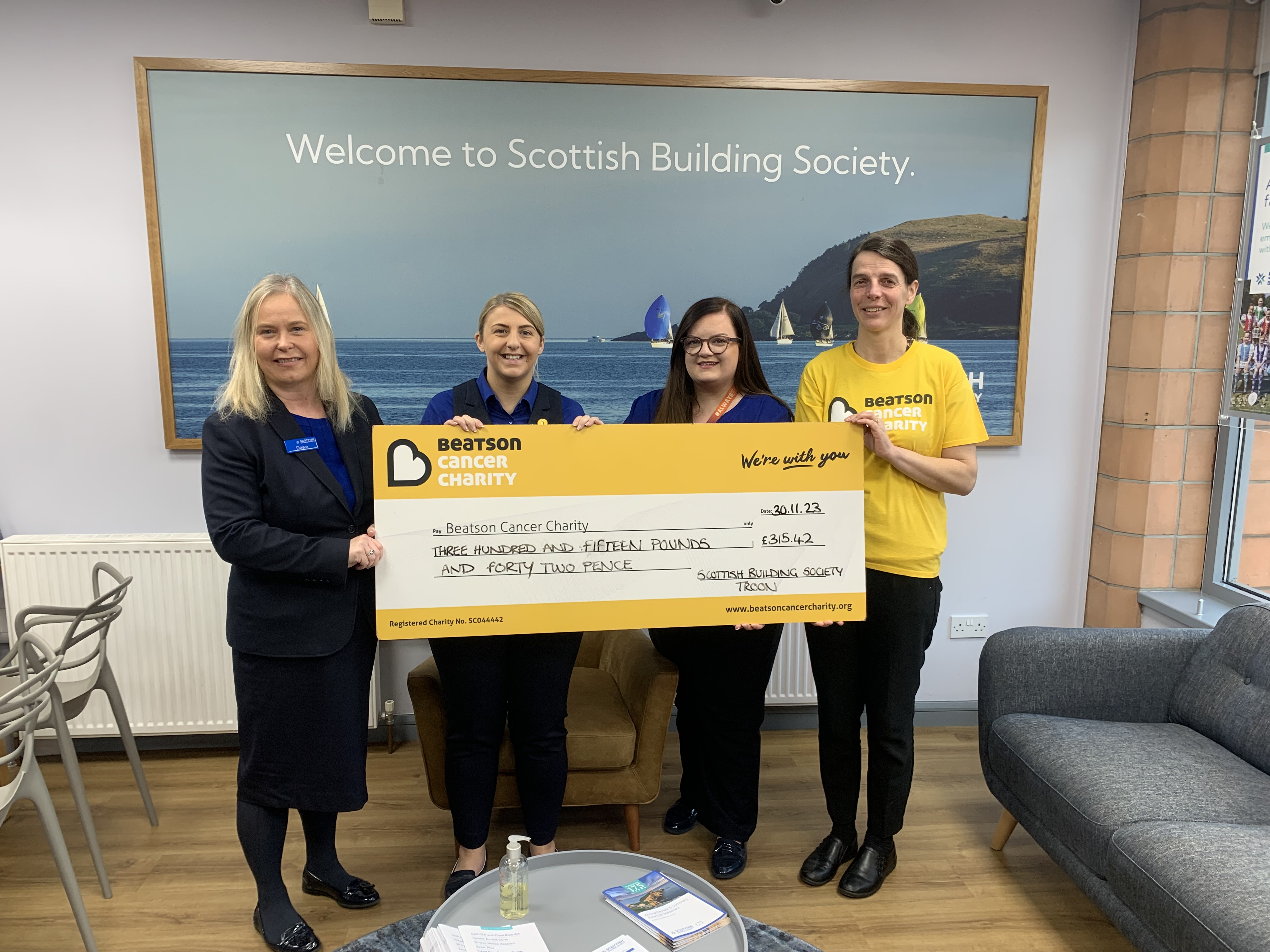 Background image: Colleagues in our Troon Relationship Centre have been fundraising for Beatson Cancer Charity 