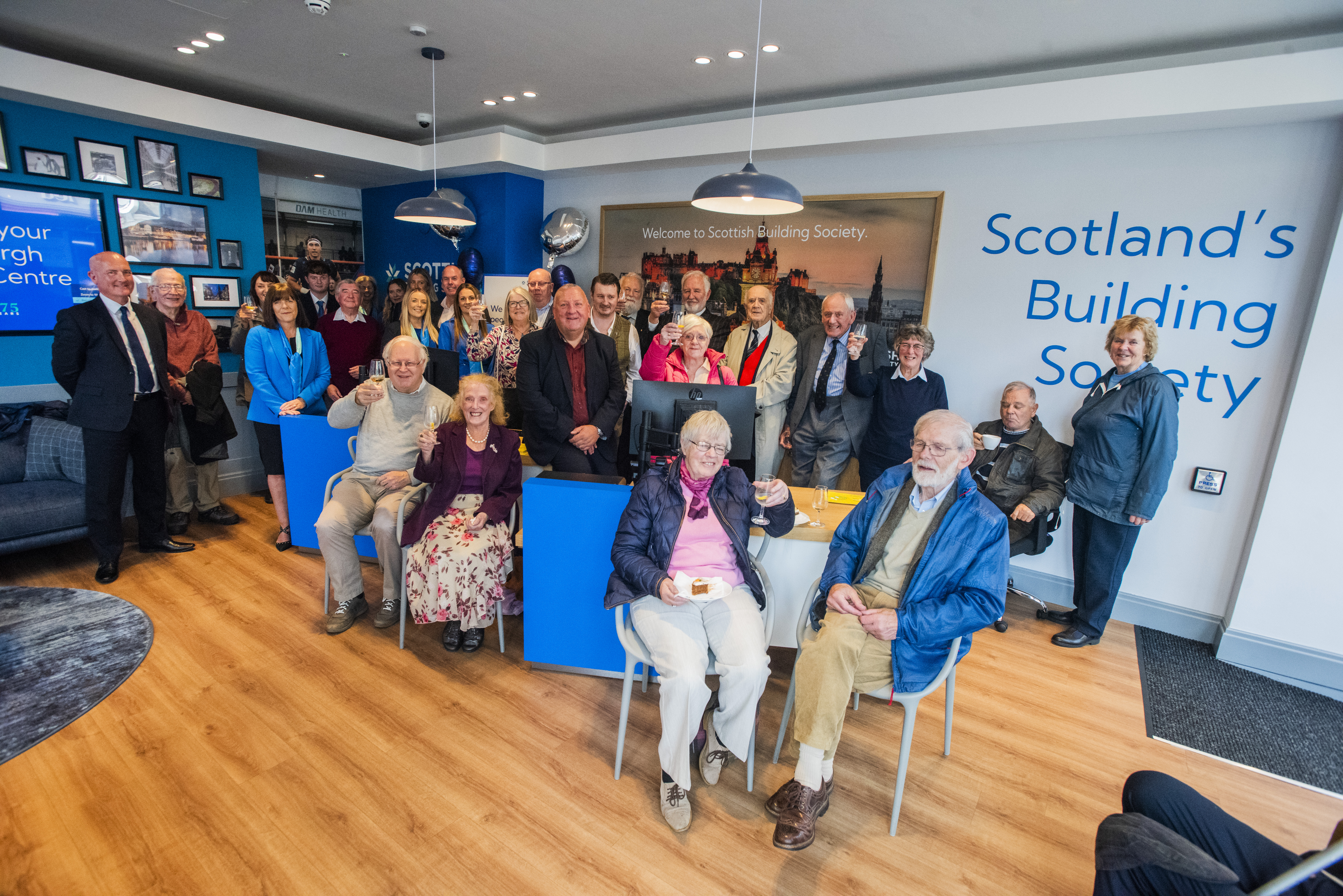 Background image: Members raised a glass to our new Edinburgh Relationship Centre 